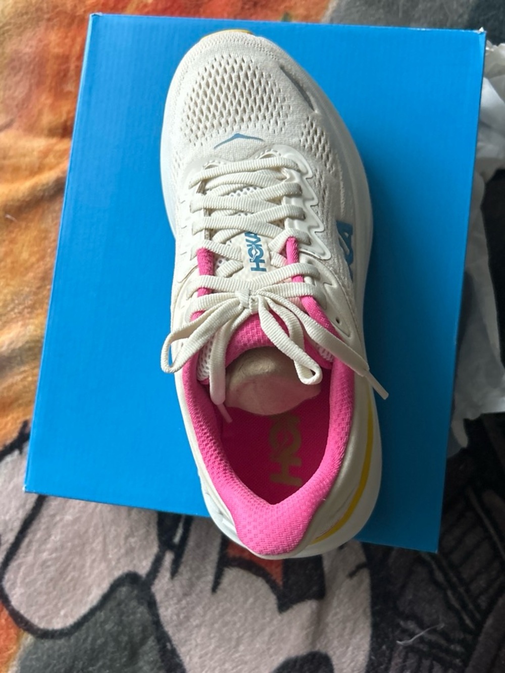 Hoka Bondi 9. Women’s Cream Athletic Shoe with Pink Lining and Yellow Accent6.5